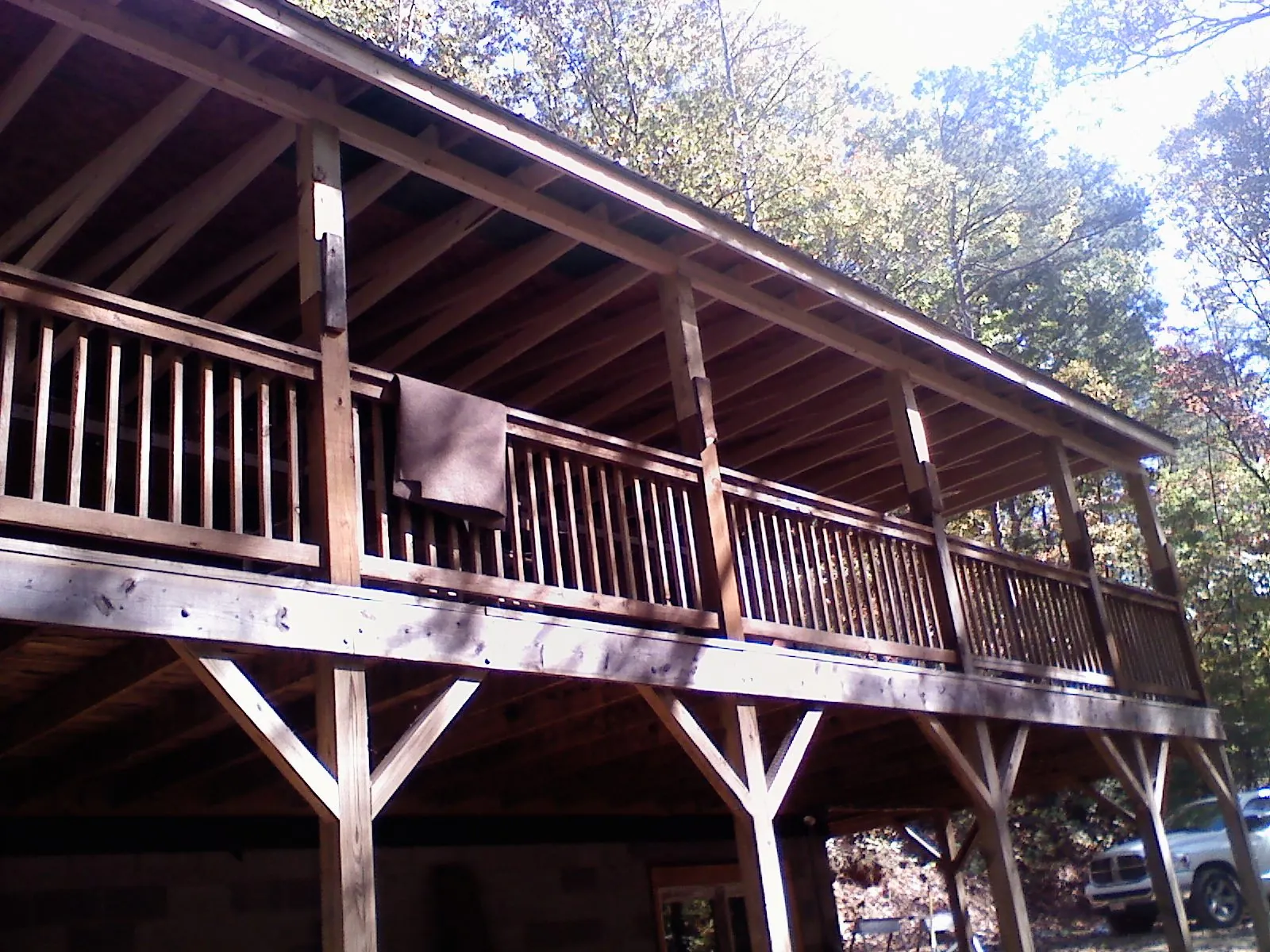 Timber framing under a new elevated porch and deck — Roof Leak Repair in New Market by Roofing Brothers